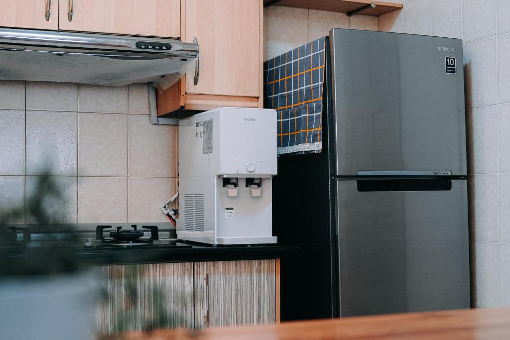 Kuchyň nebo kuchyňský kout v ubytování Gee homestay