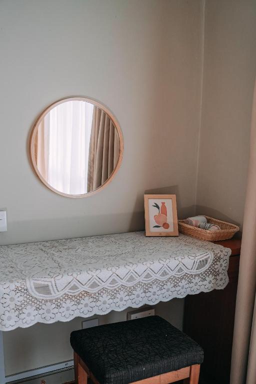 Postel nebo postele na pokoji v ubytování Gee homestay