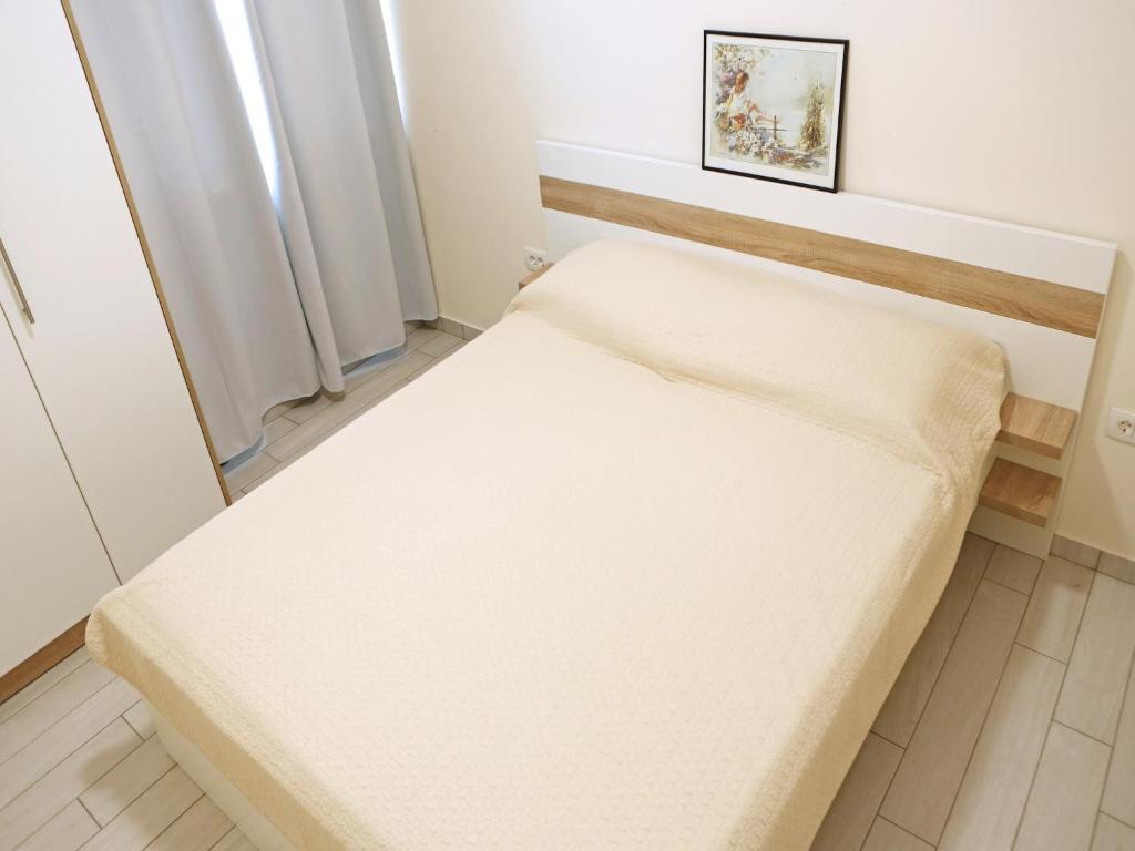Posteľ alebo postele v izbe v ubytovaní Apartment in Ljubac near the Sea