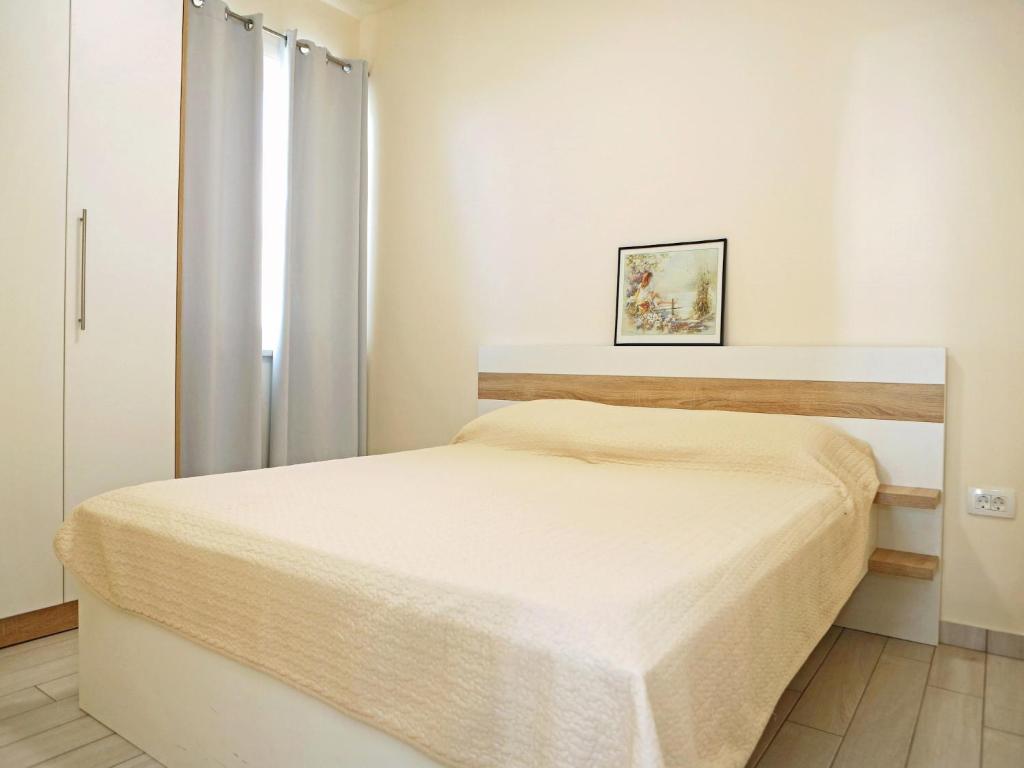 Posteľ alebo postele v izbe v ubytovaní Apartment in Ljubac near the Sea