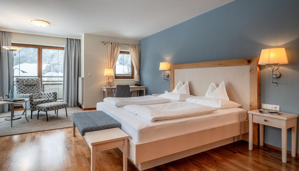 Postel nebo postele na pokoji v ubytování Hotel der Wiesenhof