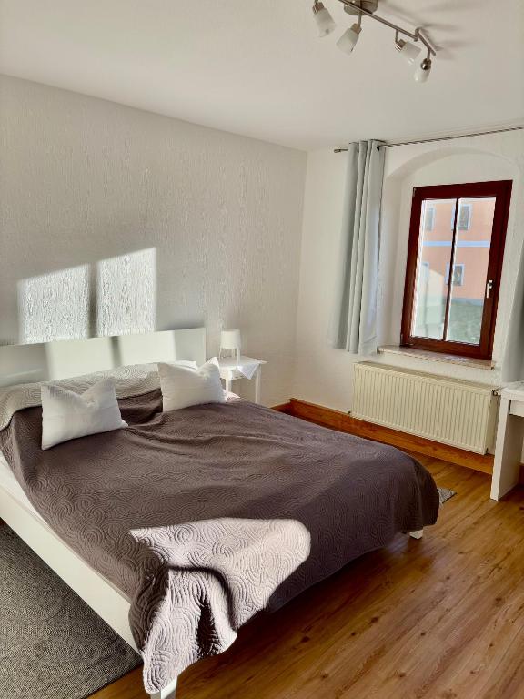 Postel nebo postele na pokoji v ubytování Kornkäfer Kleinmockritz