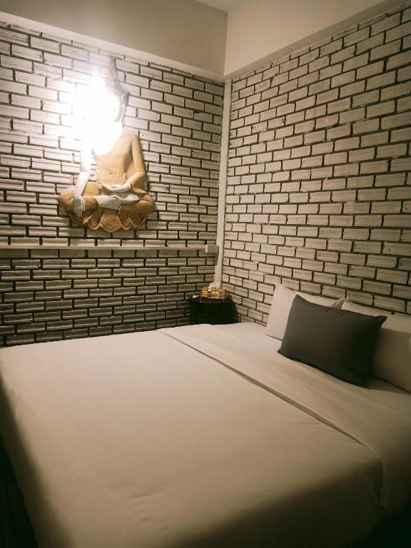 Postel nebo postele na pokoji v ubytování Anodash Homestay