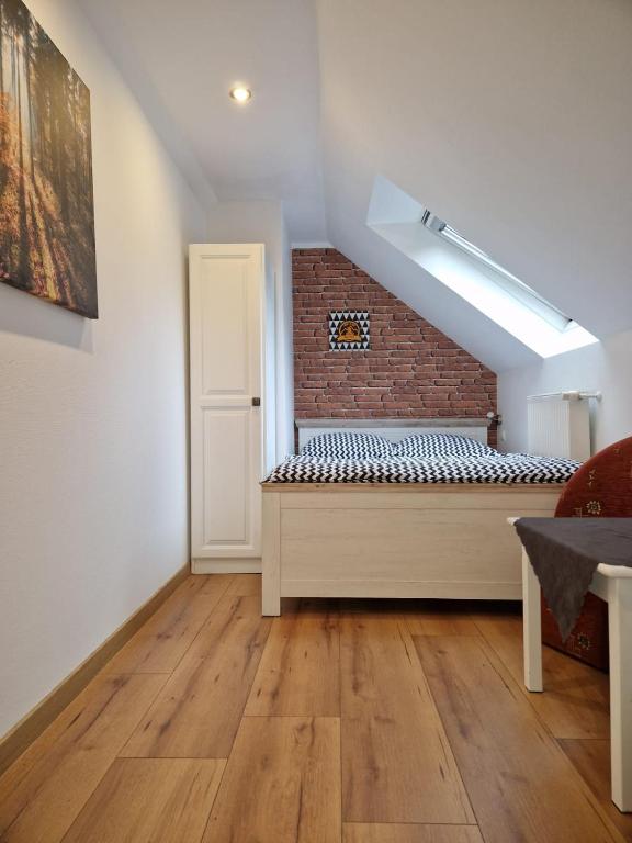 Łóżko lub łóżka w pokoju w obiekcie Willa OLA