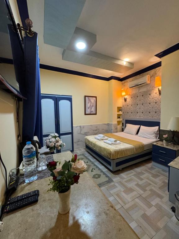 Postel nebo postele na pokoji v ubytování Sababa Hotel