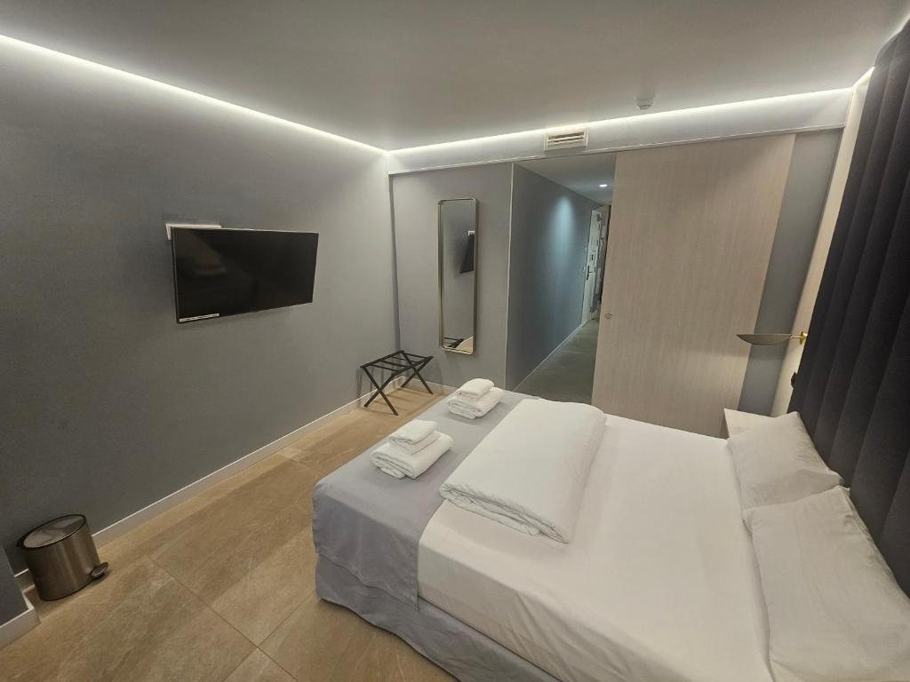 TV a/nebo společenská místnost v ubytování Estrella De Mar - Boutique ApartHotel