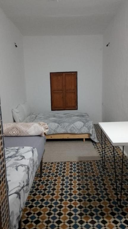 Postel nebo postele na pokoji v ubytování Riad Mtamer, Tetouan