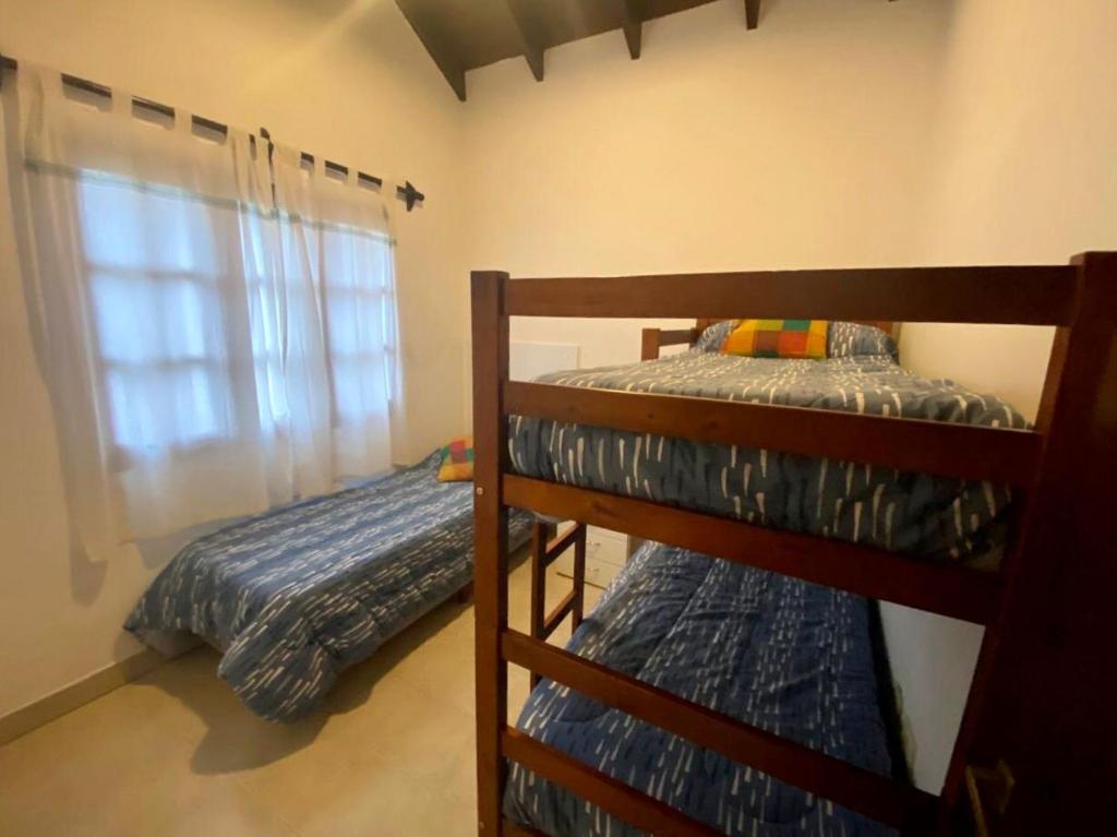 Postel nebo postele na pokoji v ubytování Pirpintos, Cabanas de San Lorenzo