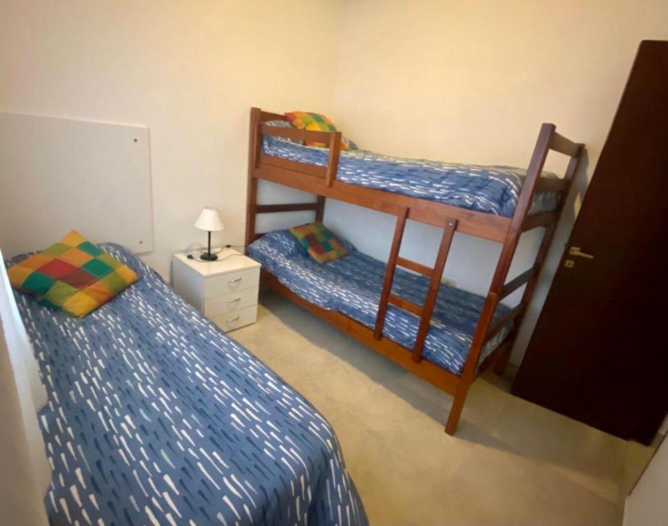 Postel nebo postele na pokoji v ubytování Pirpintos, Cabanas de San Lorenzo