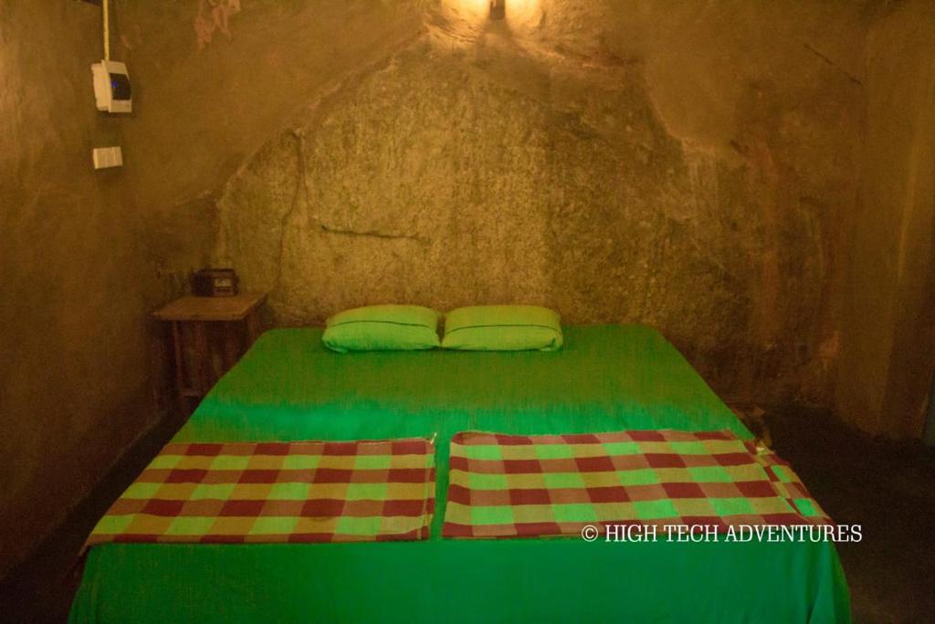 Postel nebo postele na pokoji v ubytování Chillin Rawana
