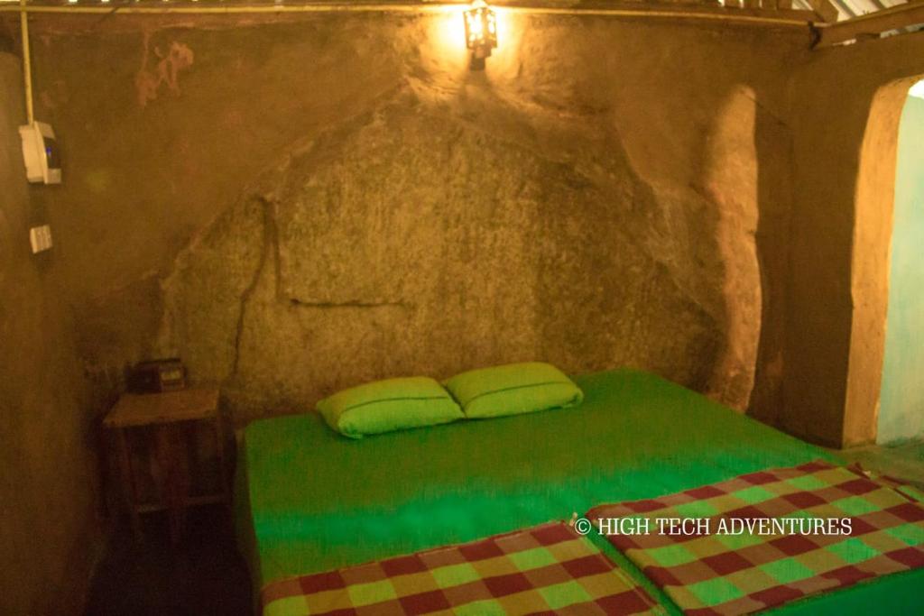 Postel nebo postele na pokoji v ubytování Chillin Rawana