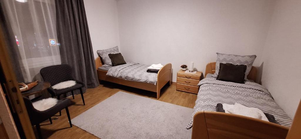 Postel nebo postele na pokoji v ubytování Haus Sissi