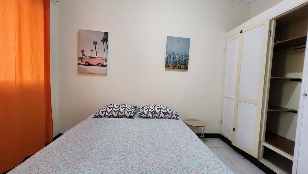 Postel nebo postele na pokoji v ubytování MEETING POINT HOSTEL-Praia Group Reservations