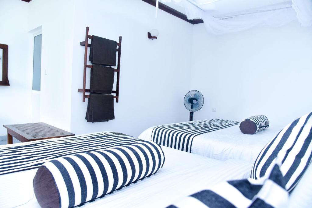Postel nebo postele na pokoji v ubytování Dawn View Home Stay