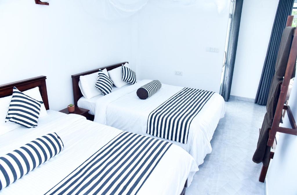 Postel nebo postele na pokoji v ubytování Dawn View Home Stay