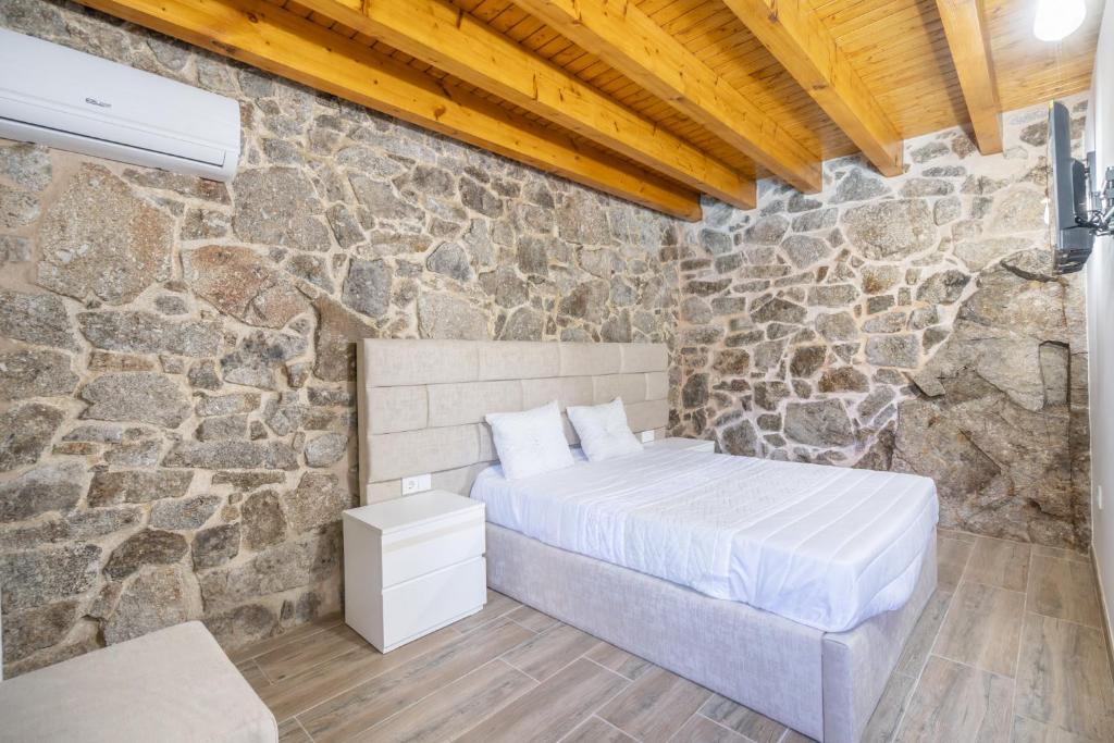 Postel nebo postele na pokoji v ubytování Moinhos do Coto
