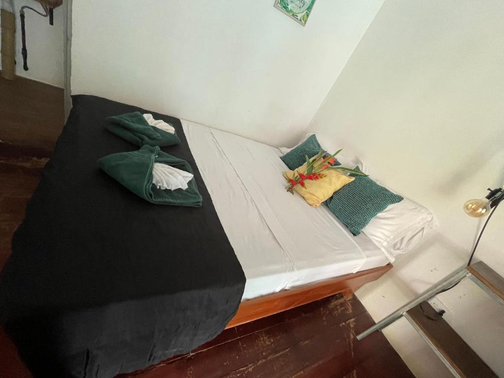 Postel nebo postele na pokoji v ubytování Uvita Pirates Hostel