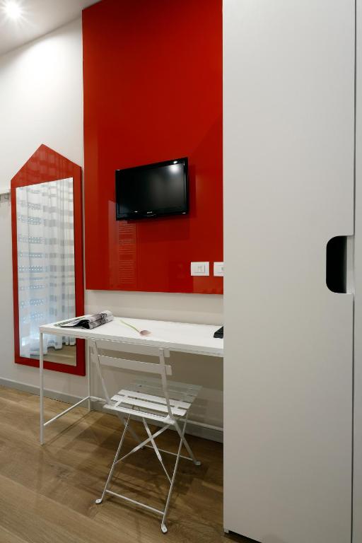 TV a/nebo společenská místnost v ubytování Hotel Aurea