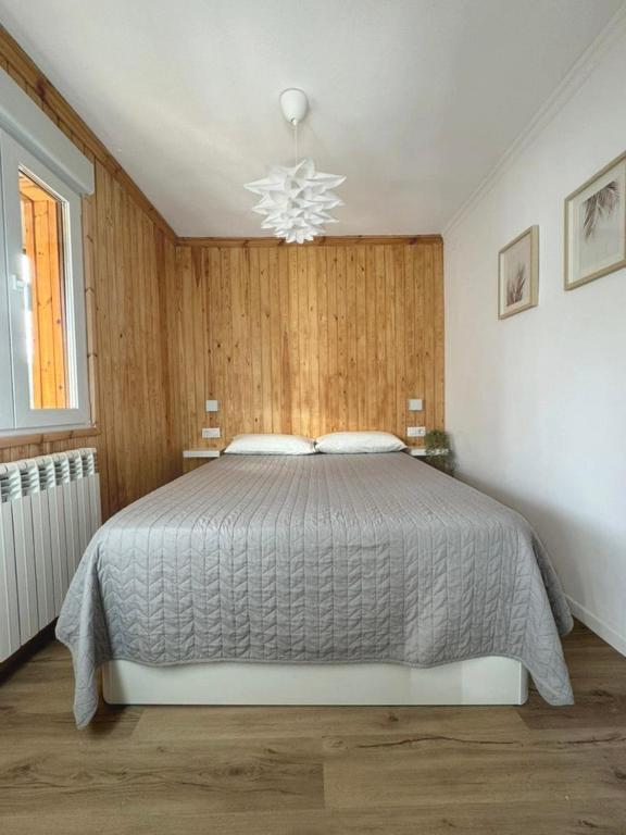 Postel nebo postele na pokoji v ubytování Pico Cerler