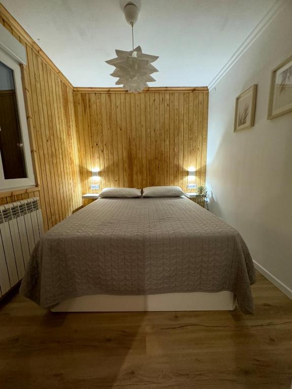 Postel nebo postele na pokoji v ubytování Pico Cerler