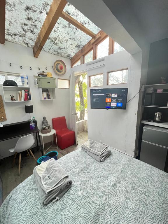 Postel nebo postele na pokoji v ubytování El Balcón de SúperAnfitrión Coyoacan