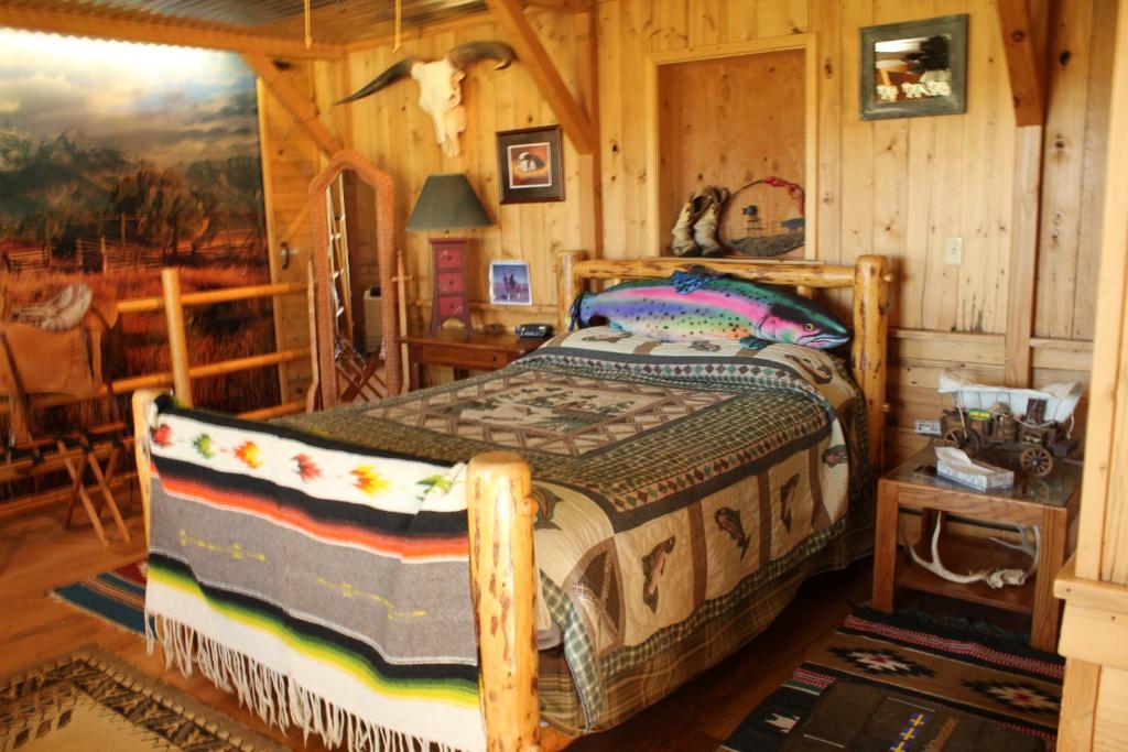 Postel nebo postele na pokoji v ubytování K3 Guest Ranch
