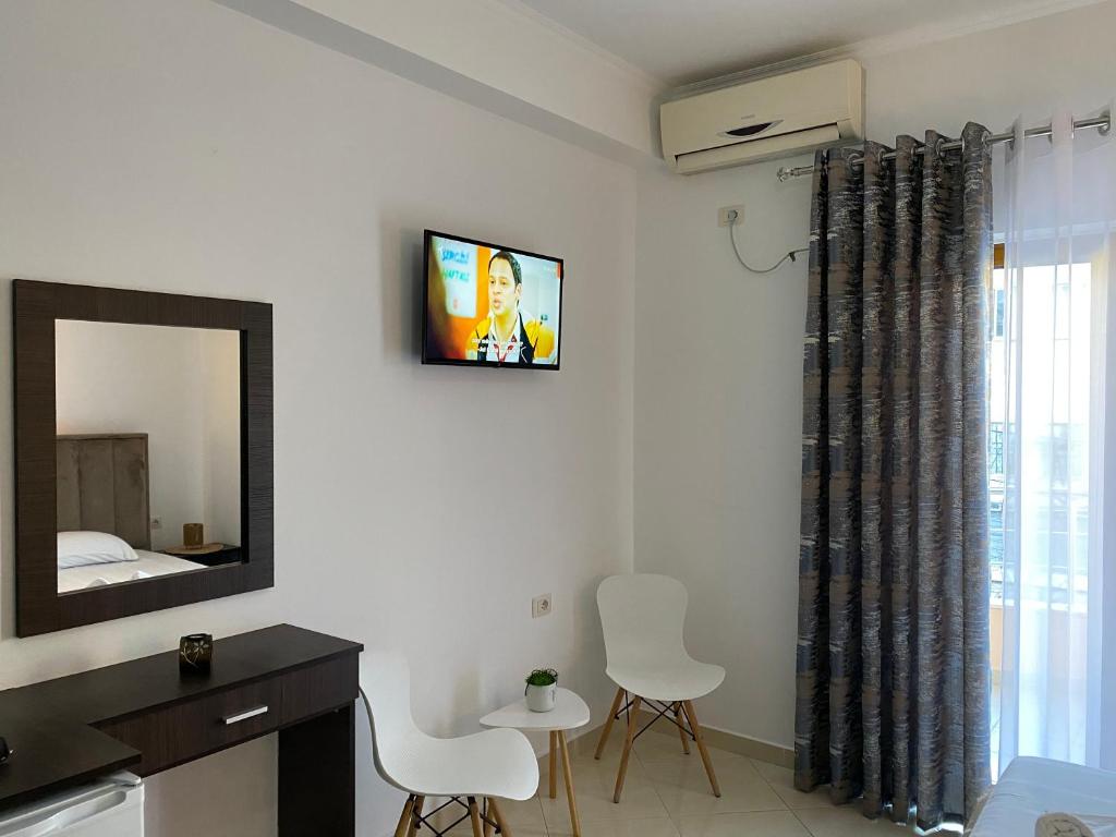 TV a/nebo společenská místnost v ubytování Hotel Metali