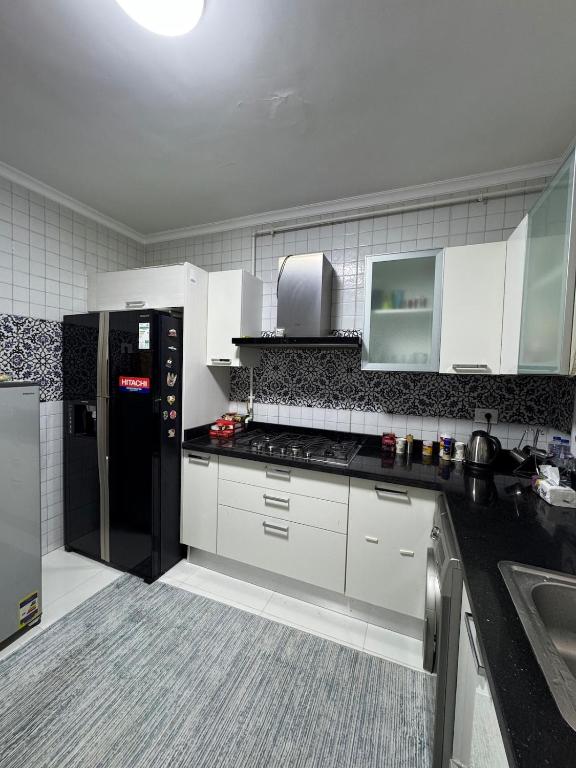 Kuchyň nebo kuchyňský kout v ubytování Apartment in New Cairo