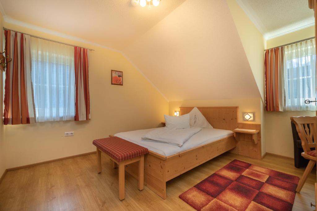 Postel nebo postele na pokoji v ubytování Appartement Jost - Nassfeld
