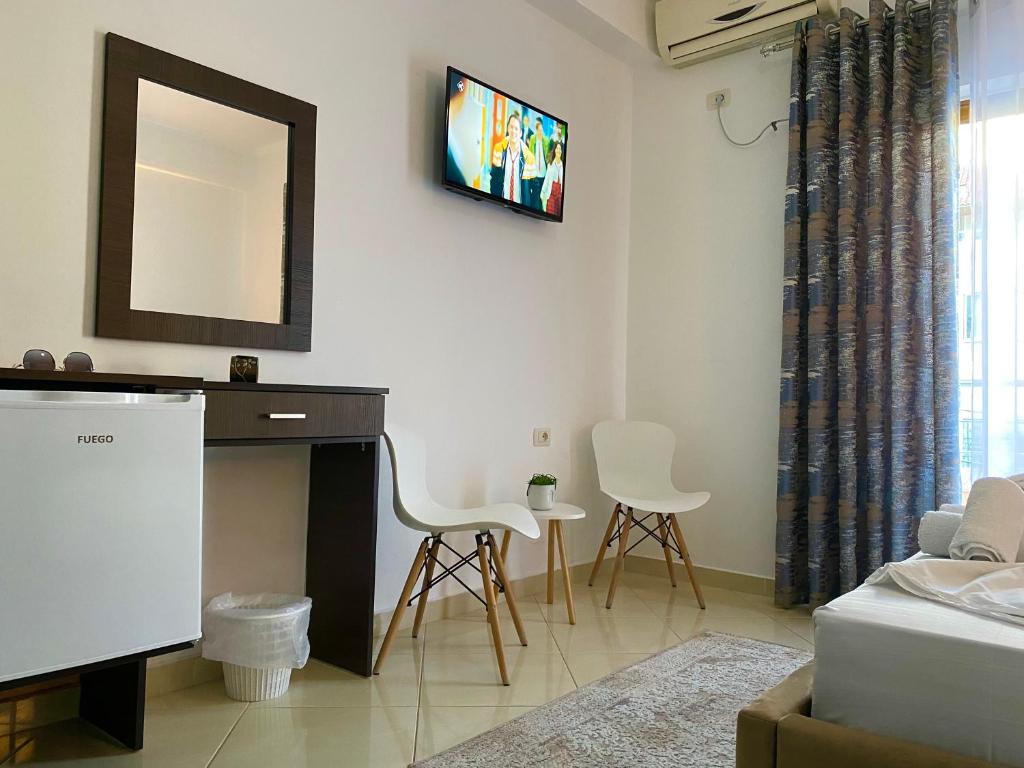 TV a/nebo společenská místnost v ubytování Hotel Metali