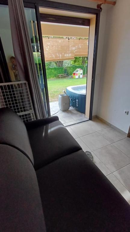 Posezení v ubytování La Kay Sicrié avec spa