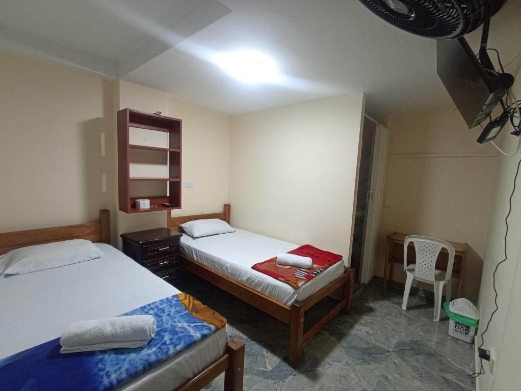 Postel nebo postele na pokoji v ubytování Hotel San Vicente