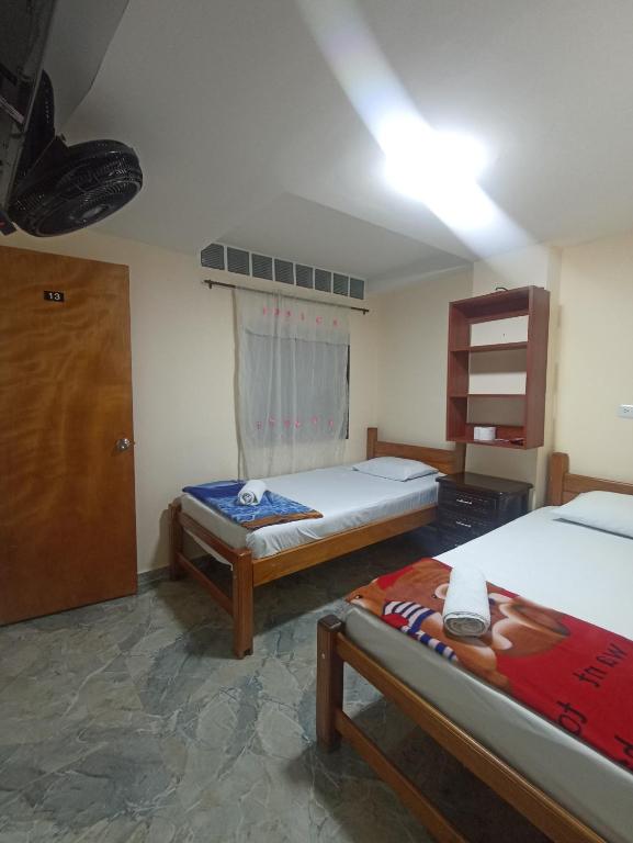 Postel nebo postele na pokoji v ubytování Hotel San Vicente