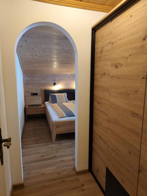 Postel nebo postele na pokoji v ubytování Gästehaus Midi