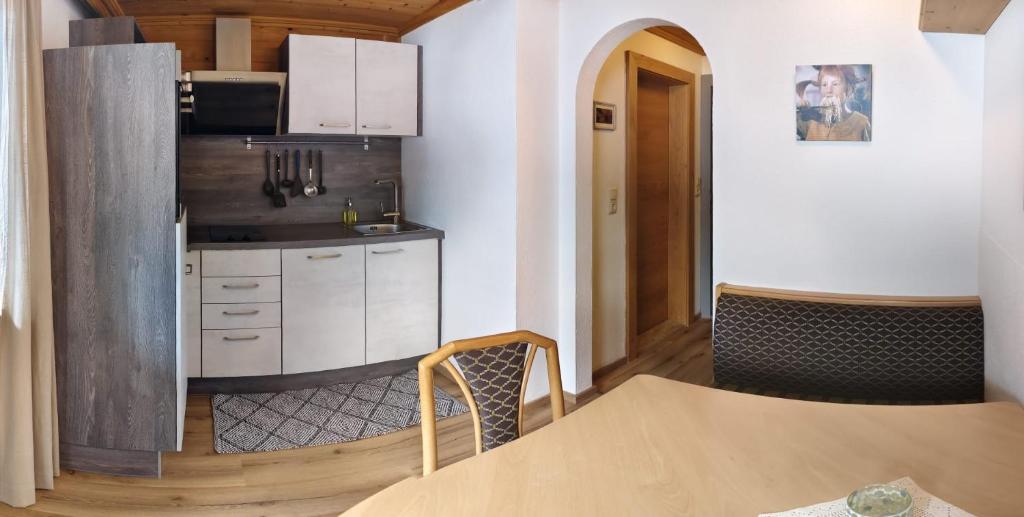Kuchyň nebo kuchyňský kout v ubytování Gästehaus Midi