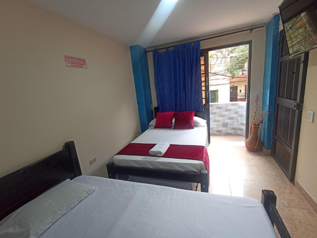 Postel nebo postele na pokoji v ubytování Hotel San Vicente