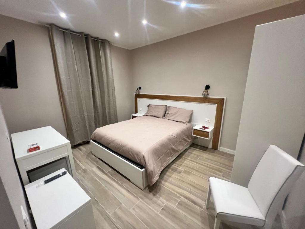 Postel nebo postele na pokoji v ubytování Matera in Centro Rooms