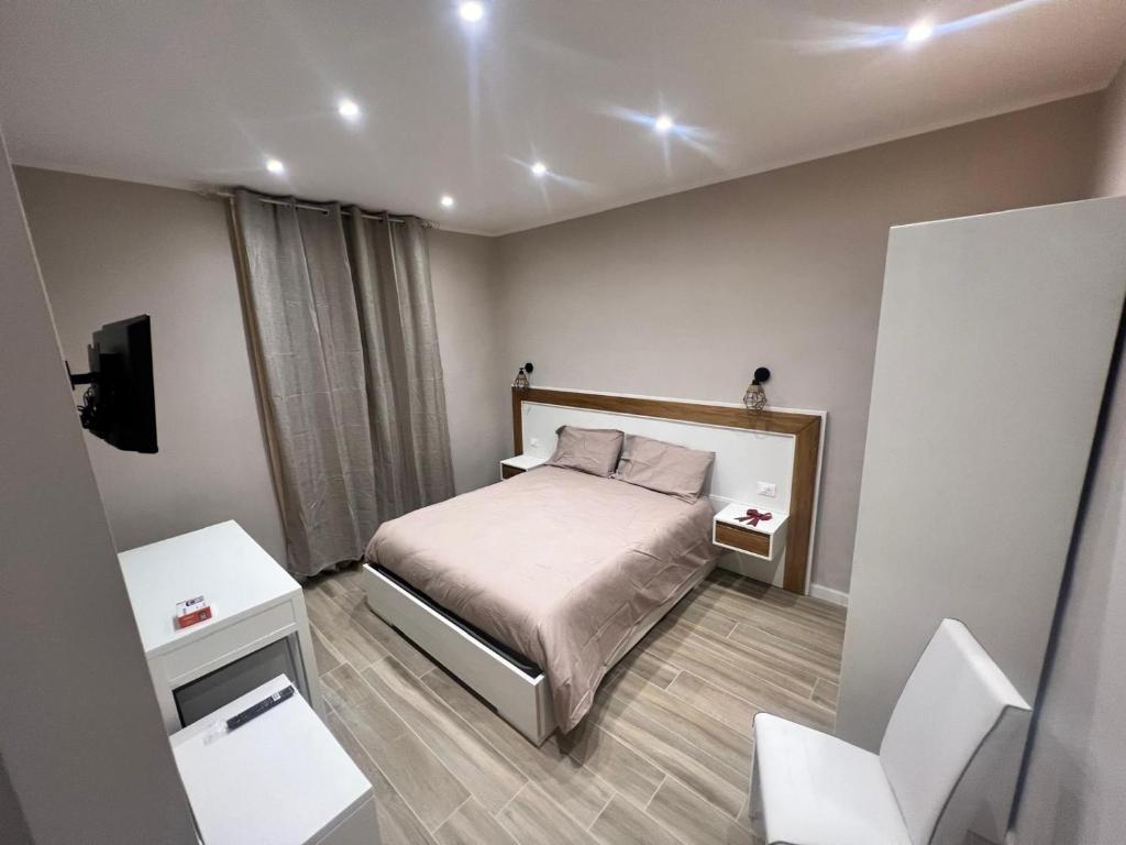 Postel nebo postele na pokoji v ubytování Matera in Centro Rooms