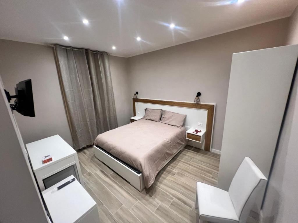 Postel nebo postele na pokoji v ubytování Matera in Centro Rooms