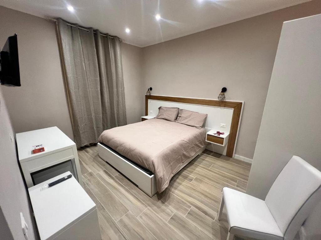 Postel nebo postele na pokoji v ubytování Matera in Centro Rooms
