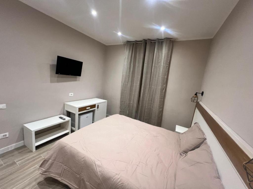 Postel nebo postele na pokoji v ubytování Matera in Centro Rooms