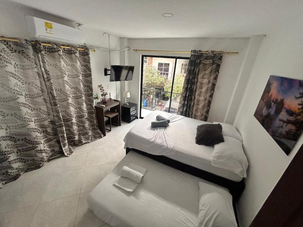 Postel nebo postele na pokoji v ubytování Hotel SG