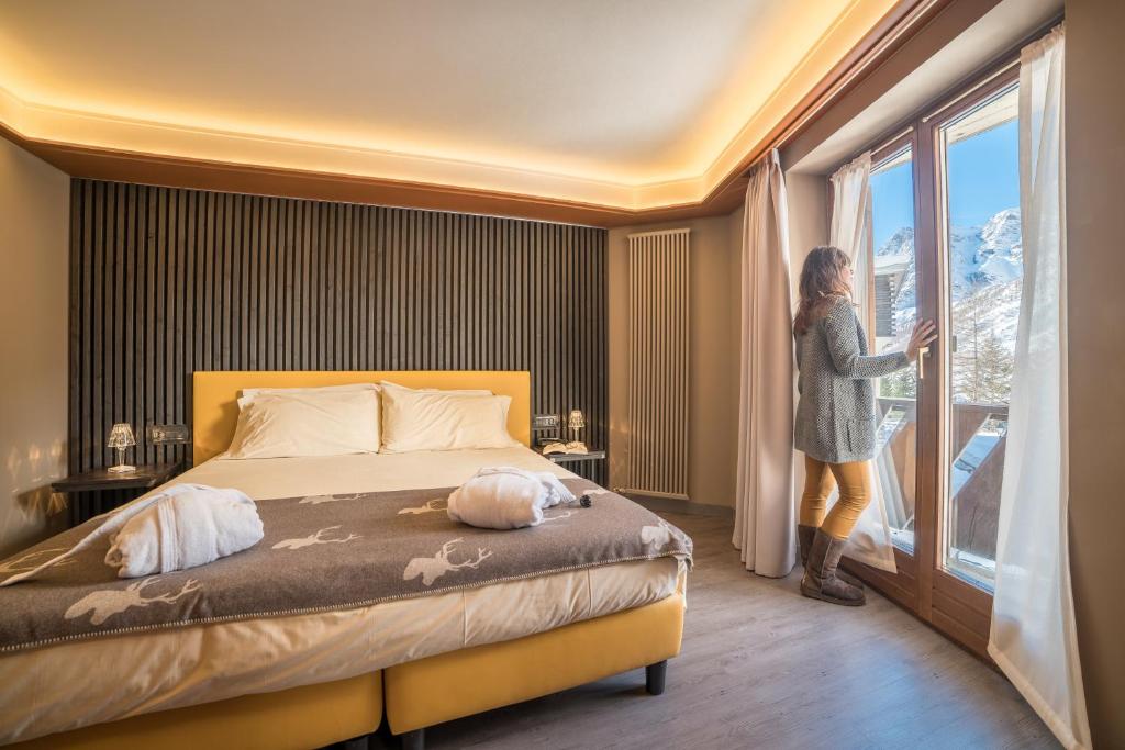 Postel nebo postele na pokoji v ubytování Hotel Europa