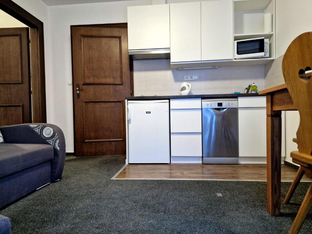 Kuchyňa alebo kuchynka v ubytovaní Pension Baranek - Baranek Resorts