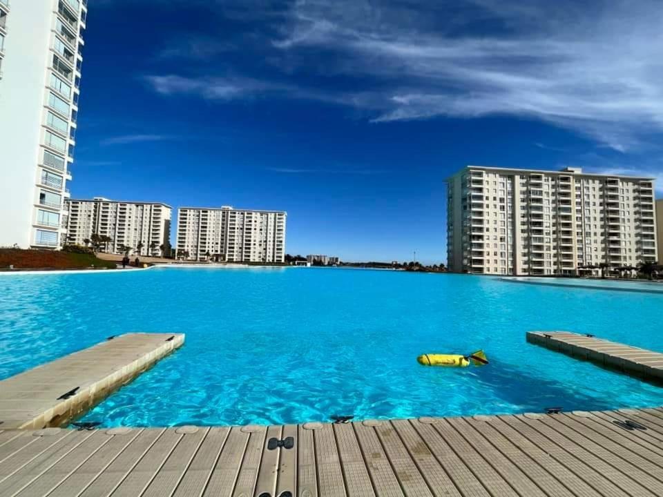 Bazén v ubytování Algarrobo Laguna Bahia Full nebo v jeho okolí