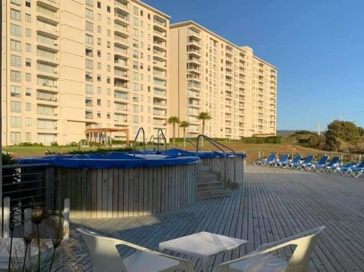 Bazén v ubytování Algarrobo Laguna Bahia Full nebo v jeho okolí