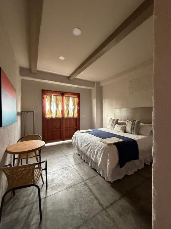 Łóżko lub łóżka w pokoju w obiekcie Coffee Tree Boutique Hostel