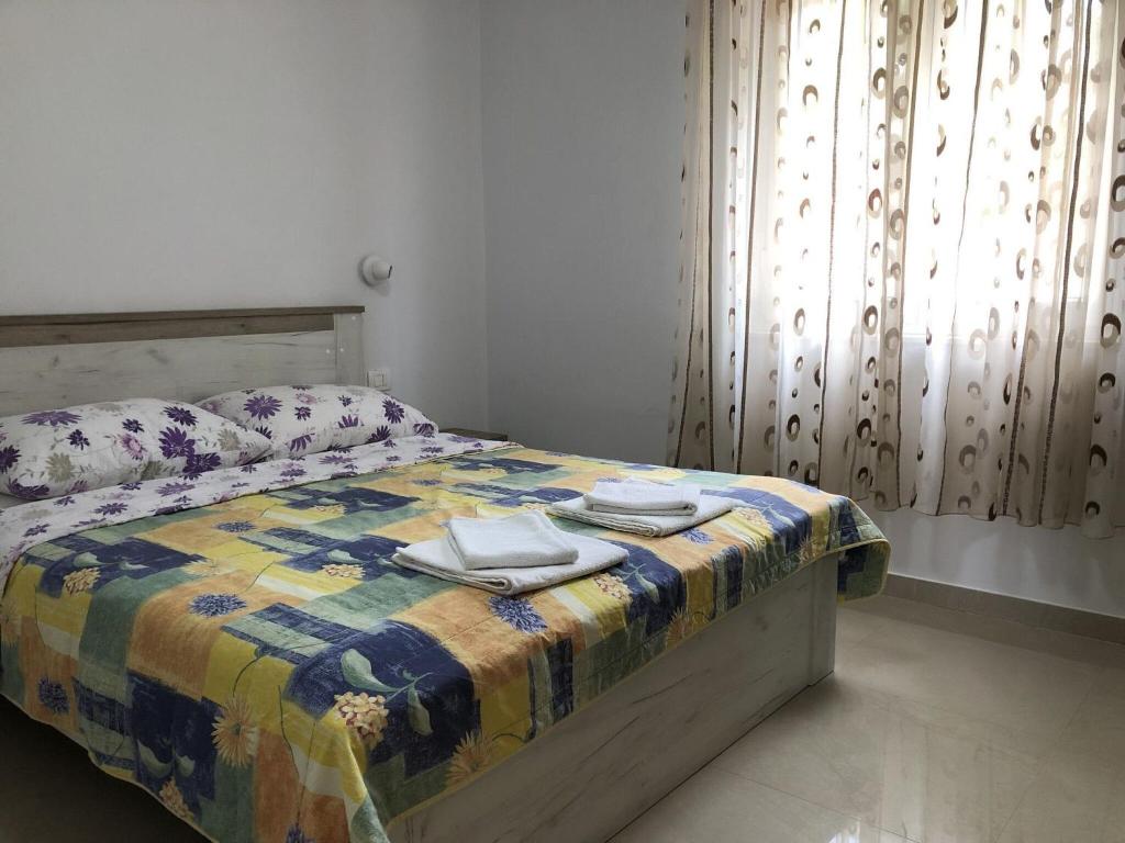 Łóżko lub łóżka w pokoju w obiekcie House LjubaV