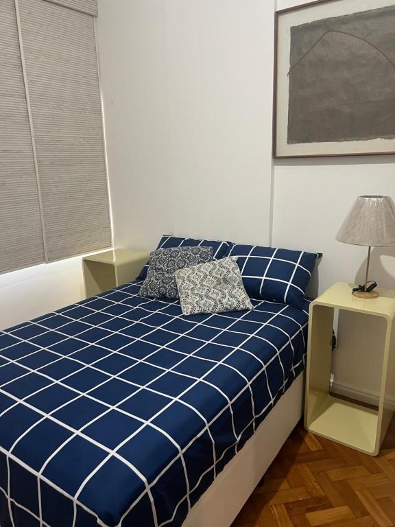 Postel nebo postele na pokoji v ubytování Leme com vista Para o Mar