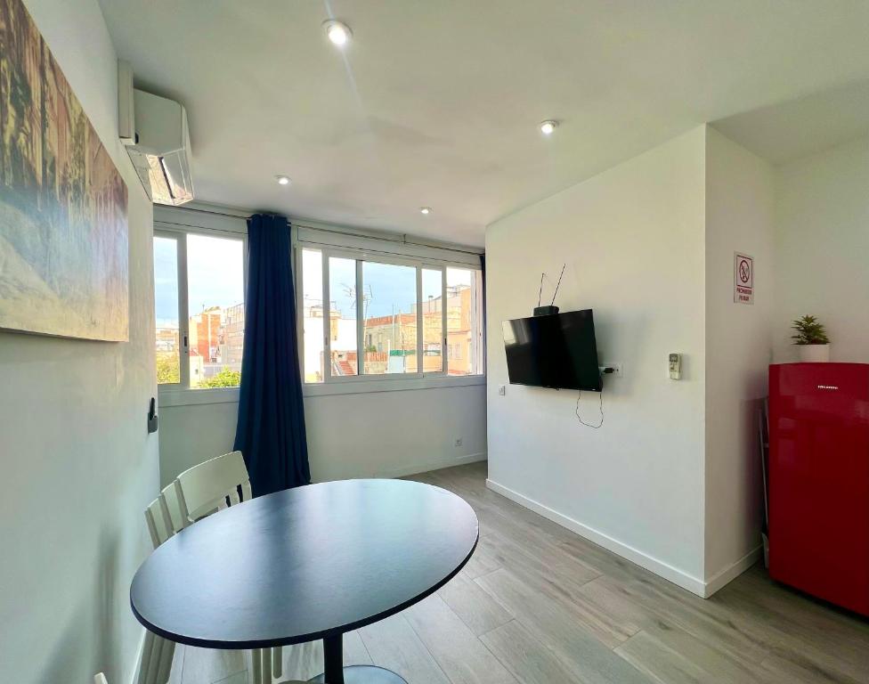 TV a/nebo společenská místnost v ubytování Apartamentos Playa